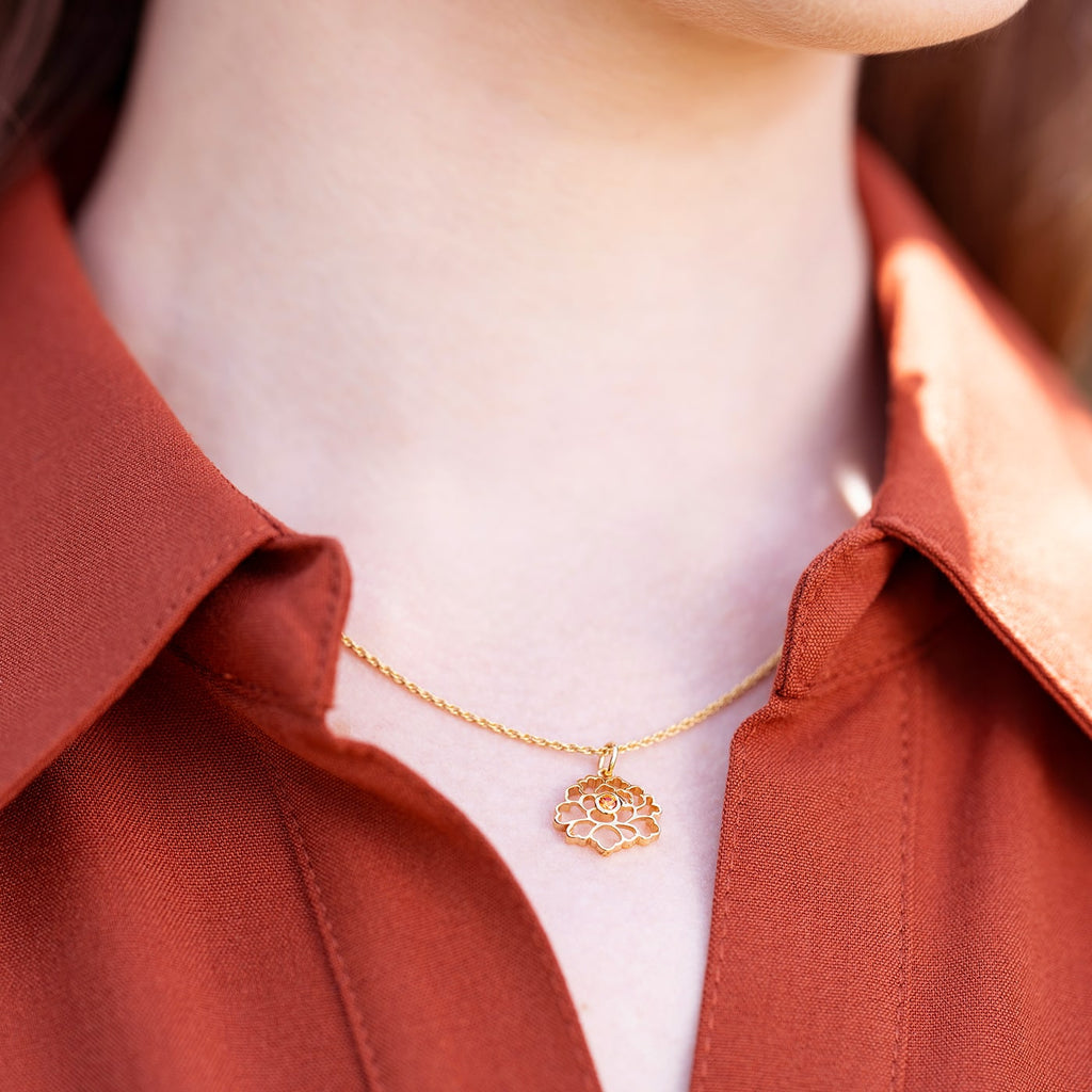 Tang Flower Charm Necklace Gold with Orange Gem Model Image | Shen Yun Collections