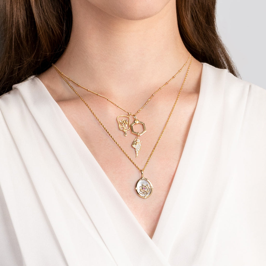 Noble Lotus Charm Gold Orchid Hand Fan Charm Joyous Dancer Charm Model Image  | Shen Yun Collections 